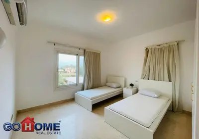 a room with two beds and a window at Spacious Villa 4 Broom Private Pool V35 at White villa in Hurghada