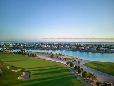 an aerial view of the golf course at the resort at Ancient Sands Golf Resort and Residences in Hurghada