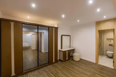 a bathroom with a toilet and a sink and a mirror at Private Villa AL Mamsha With Private Pool in Hurghada