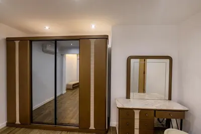 a dressing room with a mirror and a dressing table at Private Villa AL Mamsha With Private Pool in Hurghada