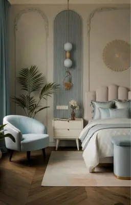a bedroom with a bed and a chair and a mirror at Royal Amber in Luxor