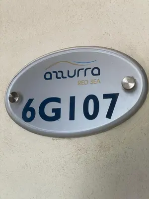 a sign on a wall with a red sea sign at Cozy 1 bedroom Apartment in Azzurra Sahl Hasheesh in Hurghada