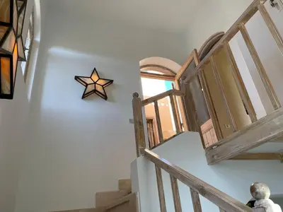 a star on a wall next to a staircase at El Gouna Villa Upper-Nubia, Sleeps 4-6 Persons in Hurghada