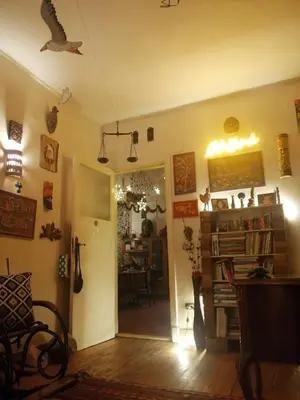 a living room with a hallway with a table and a room with at Sun of Aswan Stay in Aswan