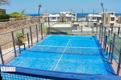 a tennis court on top of a building at Novis Holiday Homes Sahl Hasheesh in Hurghada