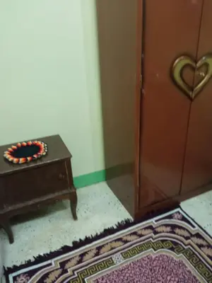 a room with a table next to a door at هاي موود in Jazīrat Aswān