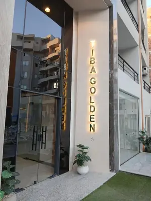 a facade of a building with a sign that reads graduate at Luxury Newly Built 2 DOUBLE bedroom and living room with Beach Access and Pool in Hurghada, Egypt in Hurghada