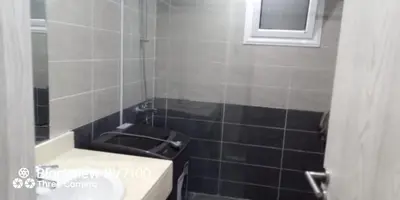 a bathroom with a sink and a toilet at Fanadir Bay Elnoras213 Hurghada in Hurghada