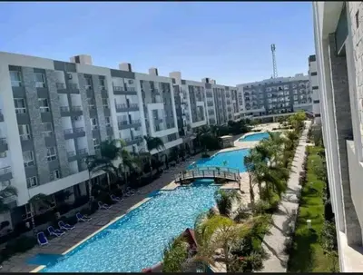 an overhead view of a swimming pool in a building at Fanadir Bay Elnoras213 Hurghada in Hurghada