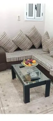 a coffee table in a living room with a couch at flat in Hurghada Sheraton Metro street in Hurghada