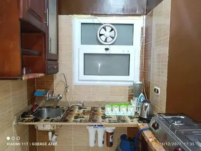 a small kitchen with a sink and a window at flat in Hurghada Sheraton Metro street in Hurghada