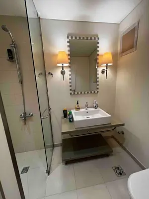 a bathroom with a sink and a shower at Luxurious Cozy studio in Sahl Hasheesh Hurghada in Hurghada