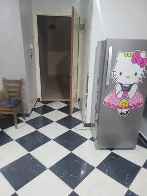 a refrigerator with a hello kitty sticker on the door at Hurghada down town in Hurghada