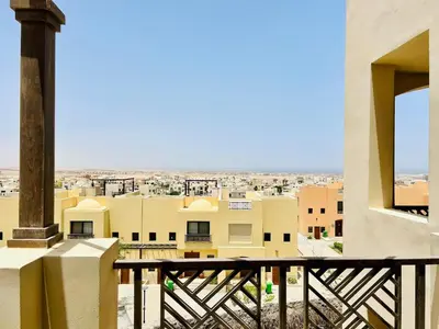 a view of the city from the balcony of a building at Sea View Serenity - Stylish 2BR Retreat in Hurghada