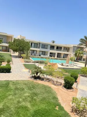 an image of a resort with a swimming pool at Cozy 2BR with pool access in Hurghada