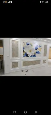 a white cabinet with flowers painted on it at الأقصر الضبعيه in Al Baghdādī