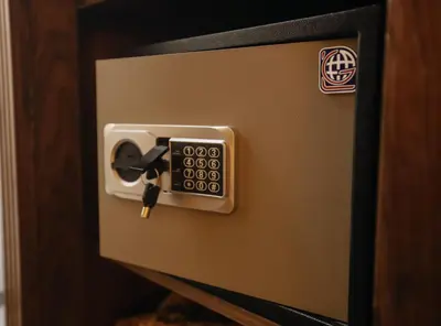 a safe with a key inserted into it at Aswan Heritage Residence-Nile View and Free Airport Pickup in Aswan