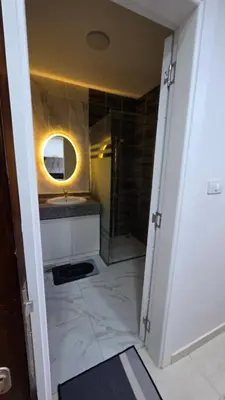 a bathroom with a sink and a mirror at See view Studio-Hurghada Selena Bay Resort in Hurghada