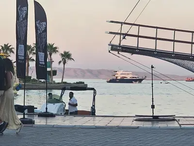 a group of people sitting on a boat in the water at Red Sea Sanctuaries in Hurghada