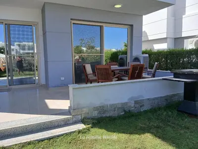 a patio with chairs and a table in front of a building at Holiday Villa in Hurhgada Egypt in Hurghada