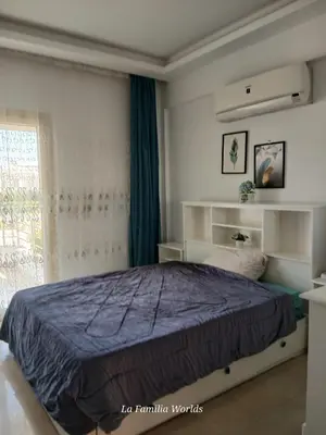 a bedroom with a large bed and a window at Holiday Villa in Hurhgada Egypt in Hurghada