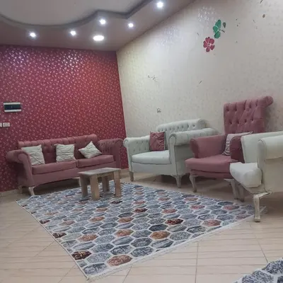 a waiting room with chairs and a rug at شقه للايجار اليومي بمدينة الغردقه مميزة جدا in Hurghada
