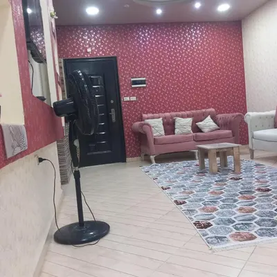 a living room with a hair dryer in a room at شقه للايجار اليومي بمدينة الغردقه مميزة جدا in Hurghada