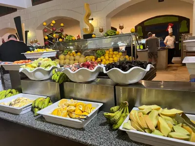 a buffet of fruits and vegetables on a counter at Pause for a while in Hurghada