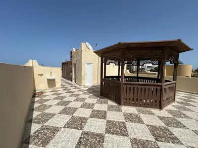 a gazebo on the roof of a building at Pause for a while in Hurghada