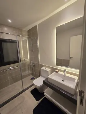 a bathroom with a toilet and a sink and a shower at El Gouna Cyan Ringe Villa with infinity pool in Hurghada