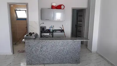 a kitchen with a counter top in a room at Oasis Marena in Hurghada