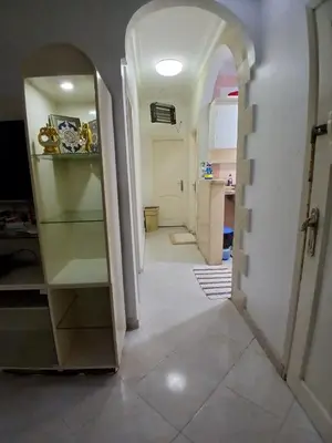 a hallway of a kitchen with an archway at عرابيا امام فندق بيروت بجوار سوبر ماركت الخضري in Hurghada