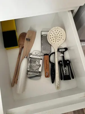 a drawer filled with cooking utensils in a kitchen at Royal Club Residence in Port Ghalib