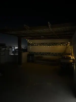 a group of lights on a roof at night at Poraa roof in Hurghada