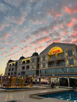 a large building with a mcdonalds sign on it at Hurghada Hub Resort in Hurghada