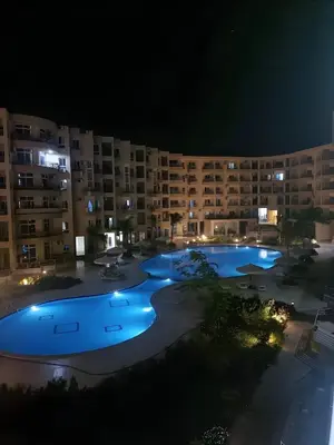 an aerial view of a resort at night at Princess Beachfront Resort Hurghada in Hurghada