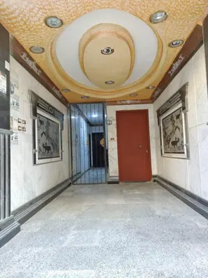 a hallway with a ceiling with a red door at flat in Hurghada Sheraton Metro street in Hurghada