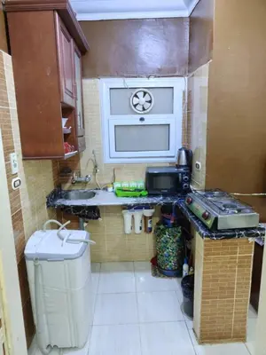 a small kitchen with a sink and a stove at flat in Hurghada Sheraton Metro street in Hurghada