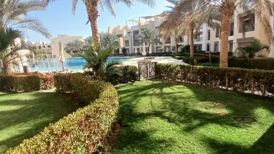 a gate in a yard in front of a resort at Mangroovy Gouna Beach and pool in Hurghada