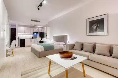 a large living room with a bed and a couch at Al Saraya Sahl Hasheesh by Peaks One Bedroom Apartment With Pool View B405&A410 in Hurghada