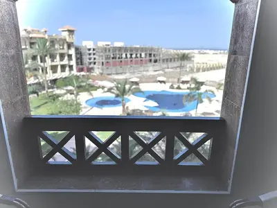 a window with a view of a pool and buildings at Al Saraya Sahl Hasheesh by Peaks One Bedroom Apartment With Pool View B405&A410 in Hurghada