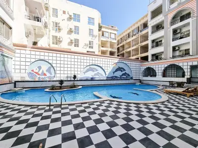 a swimming pool in the middle of a building at Sheraton Plaza Hurghada in Hurghada