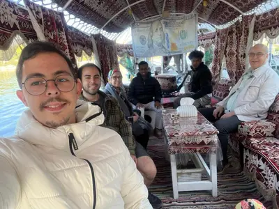 a group of people sitting on a bus at Luna Nile in Aswan