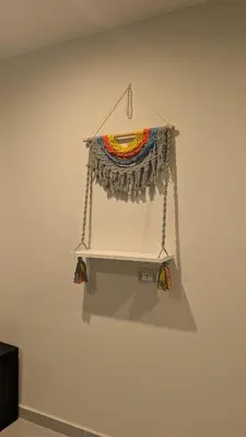a curtain is hanging on a wall at Hostify Hostel and Rooftop in Hurghada