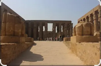 a group of people standing in front of a building at Elbess For Tourism in Al Karnak