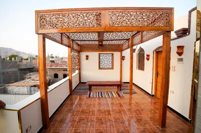 a view from the balcony of a house at The Village House with Private Garden - Four Bedroom Nubian Home on Luxor West Bank in Luxor