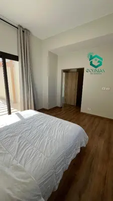 a bedroom with a white bed in a room at Shedwan Twinhouse 3 bedrooms in Hurghada