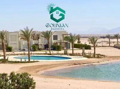a resort with a swimming pool in the desert at Shedwan Twinhouse 3 bedrooms in Hurghada