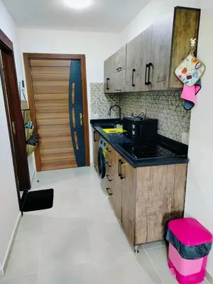 a kitchen with a sink and a counter top at Private Beach Chalet in Orabia in Hurghada