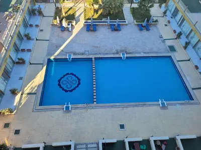 an overhead view of a large swimming pool on a building at Casablanca star hurghada in Hurghada